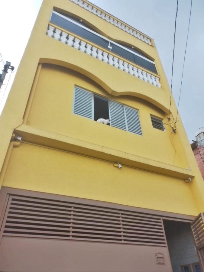 Sobrado à venda com 6 quartos, 301m² - Foto 1